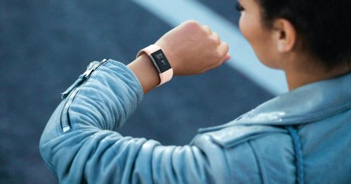 Are Fitness Trackers the Future of Health? checking watch
