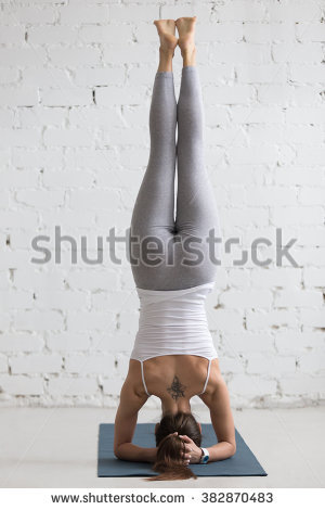 grey pants white top yoga