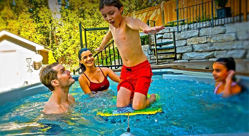 What is a Self-Cleaning Swim Spa? child swimming