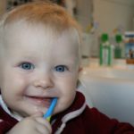 9 Effective Tips To Keep Your Baby’s Teeth Healthy happy brush