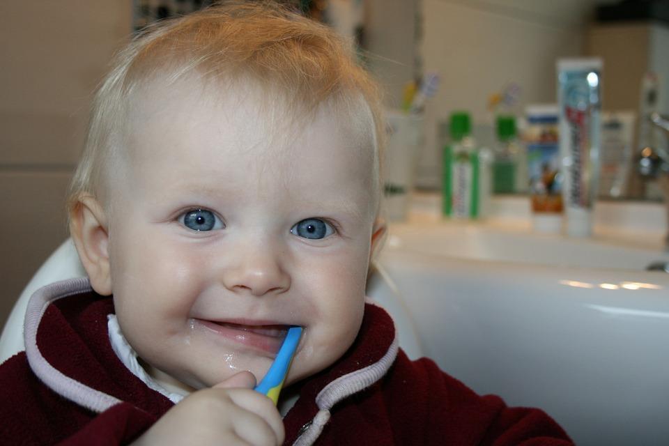 9 Effective Tips To Keep Your Baby’s Teeth Healthy happy brush